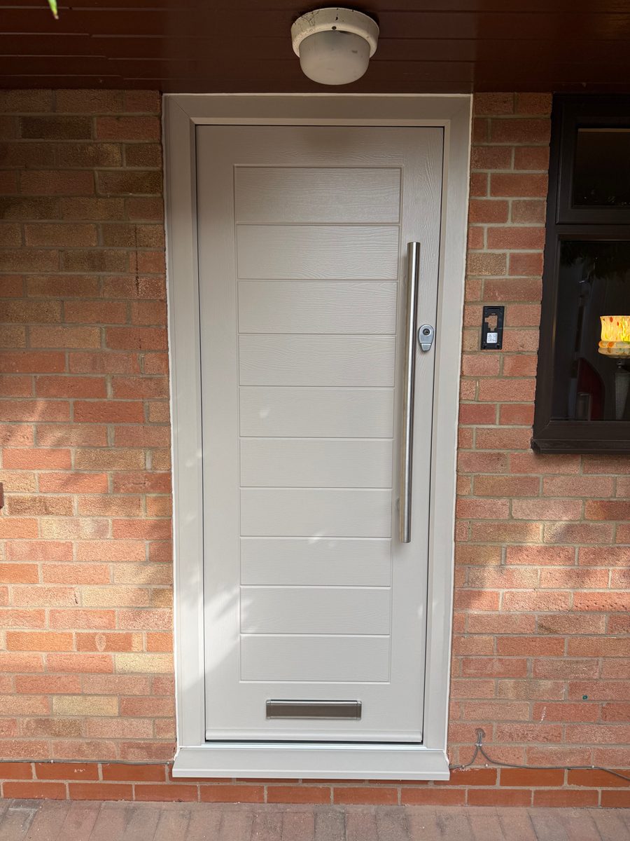 Contemporary cream front door with bar handle