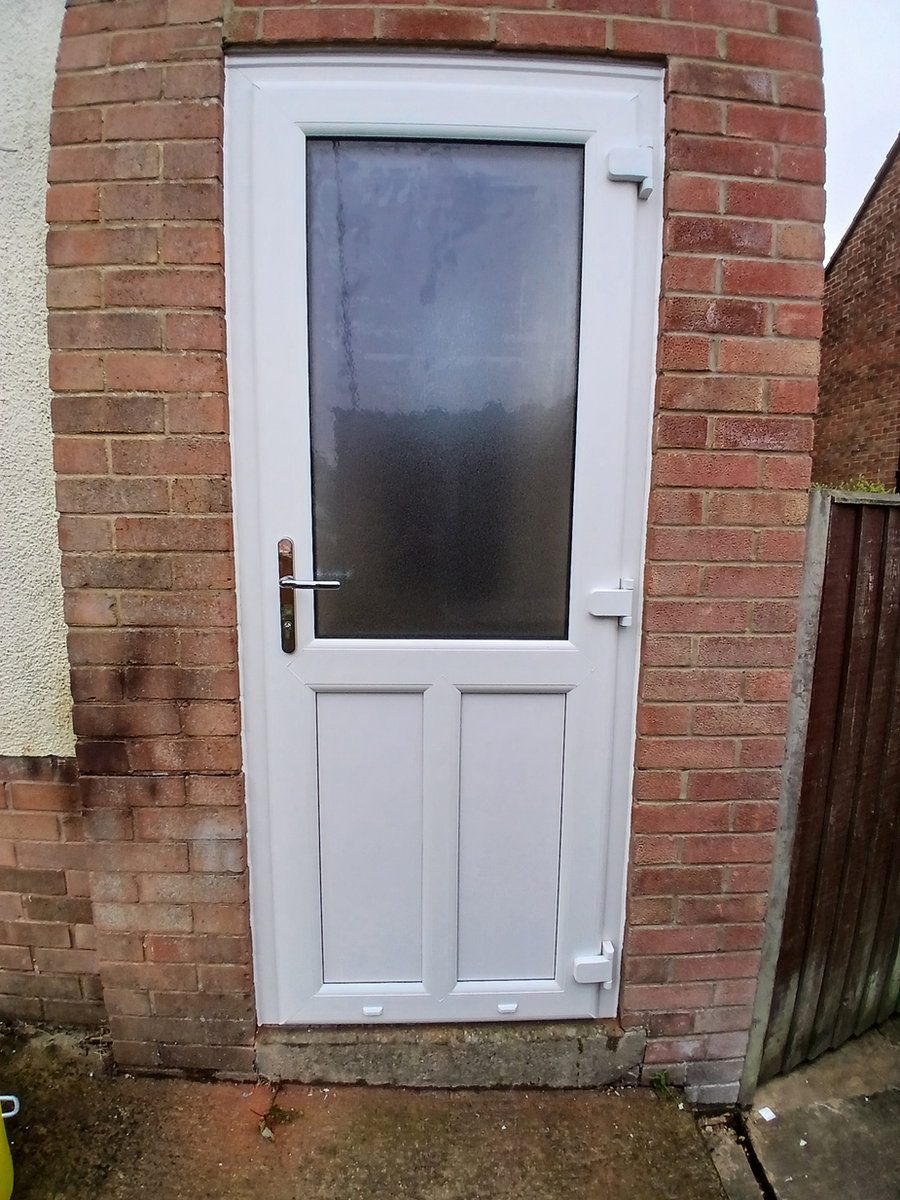 White half-glazed uPVC back door